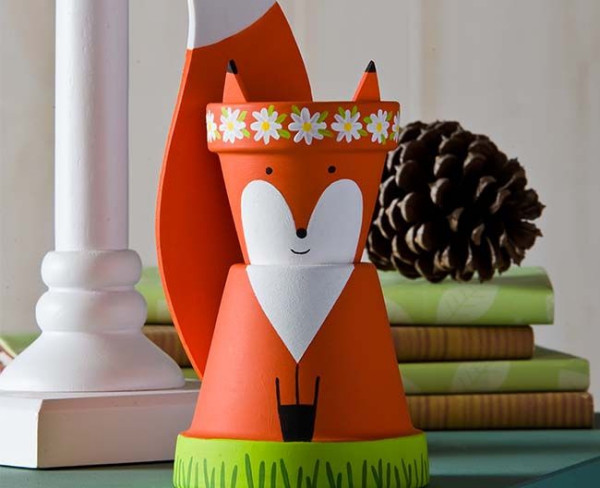 bricolage jardin avec des pots en terre cuite renard