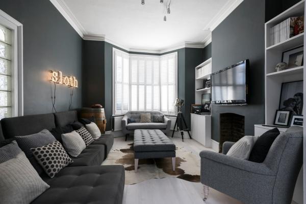 salon peinture murale gris anthracite mobilier coloré de différentes nuances du gris sol et plafond blancs salon gris anthracite mobilier coloré de différentes nuances du gris