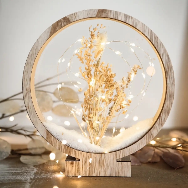 accessoire de noel moderne, cercle en verre rempli de neige et lumières