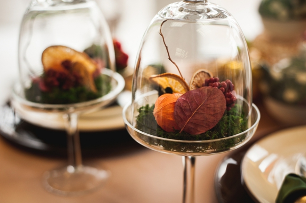 autumn decor with dry flowers and oranges