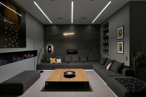 déco salon gris éclairage led table rectangulaire en bois mur en briques noires