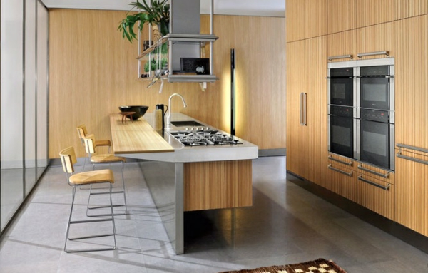 tendances cuisine 2020 comptoir bar teck et marbre four encastré dans les armoires de cuisine