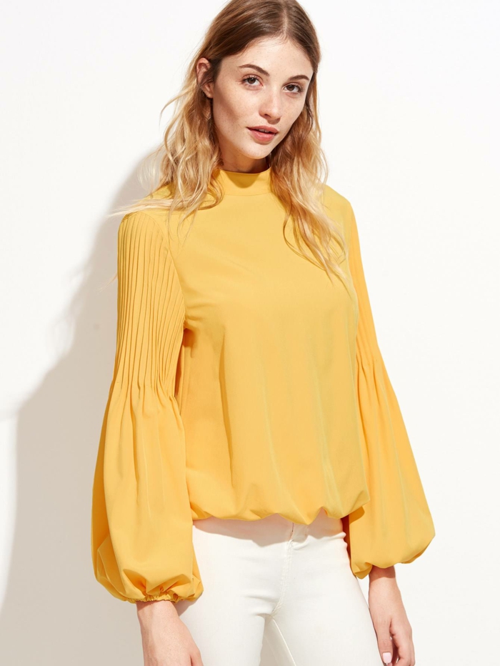 blouse jaune à manches bouffantes
