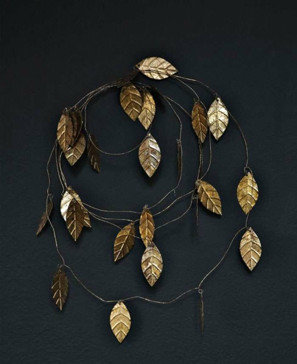 idée de décoration noël tendance guirlande de feuilles dorées