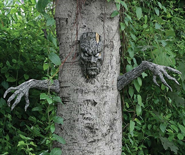 idée de décoration extérieur halloween diy arbre hanté mains et visage en argile